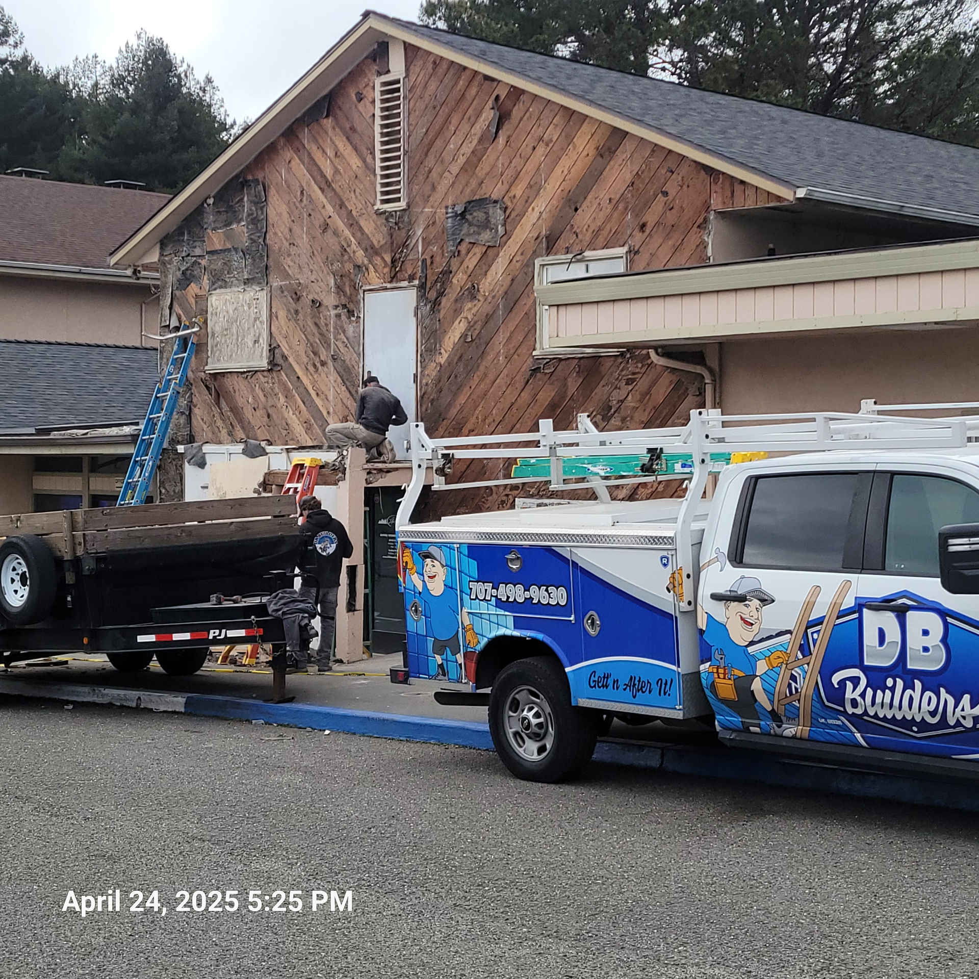 Douglas Biltzen's DB Builders team performing exterior renovation on a building in Humboldt County, CA, with DB Builders truck
