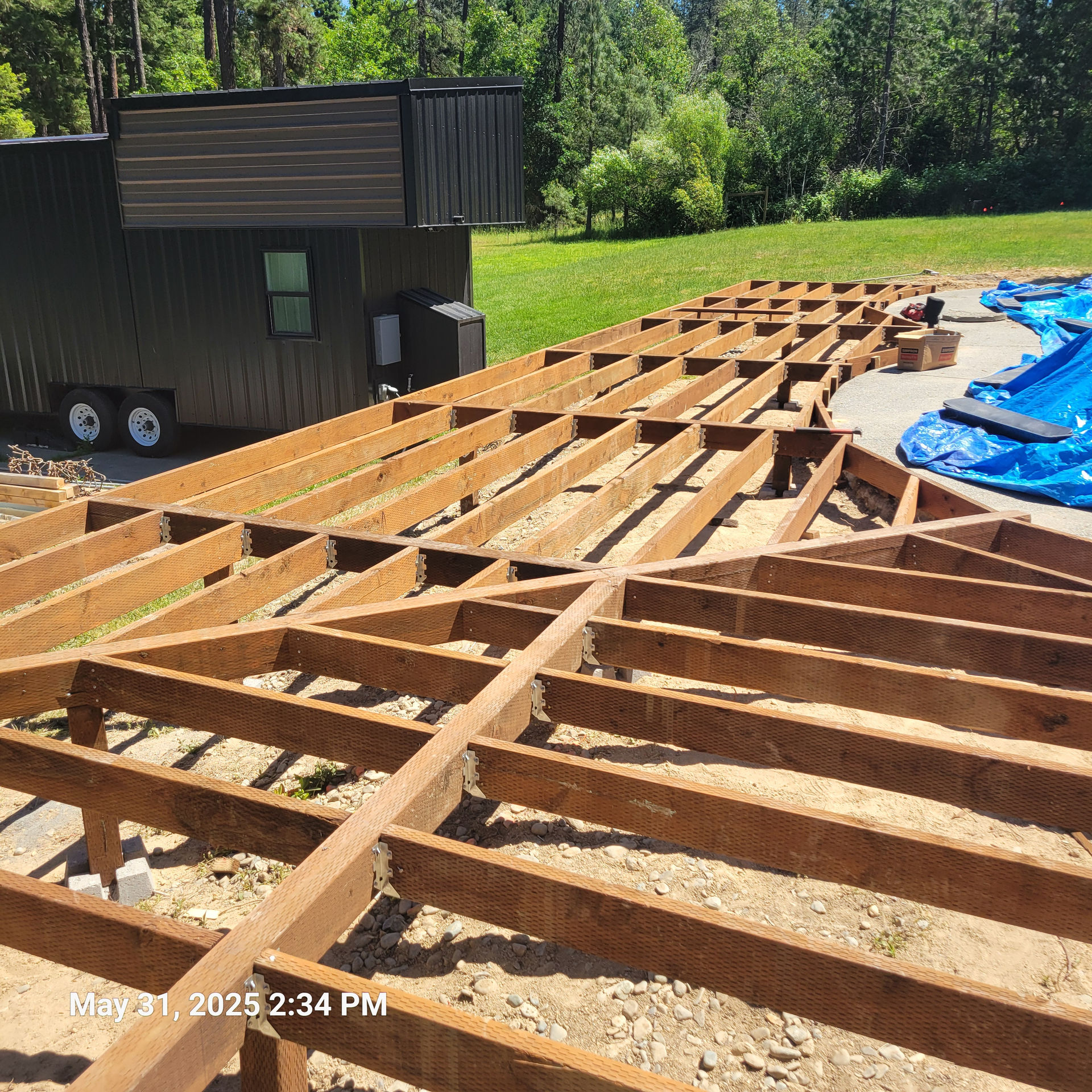 Douglas Biltzen's DB Builders team framing a large custom deck in Humboldt County, CA